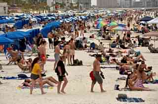 Image courtesy, metro.uk.com. Thousands of spring breakers ignore COVID-19 warnings by flocking to Miami beaches to party