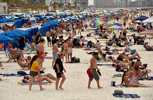 Image courtesy, metro.uk.com. Thousands of spring breakers ignore COVID-19 warnings by flocking to Miami beaches to party