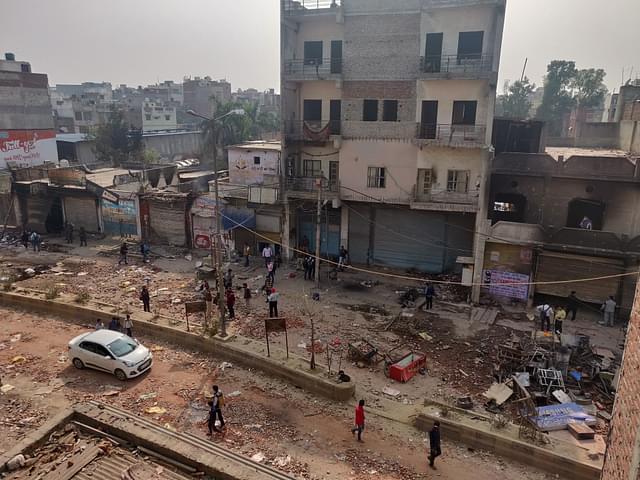 The picture has been clicked from a rooftop in Moonga Nagar, which is opposite to the tall building where Tahir Hussain has his office/Swarajya