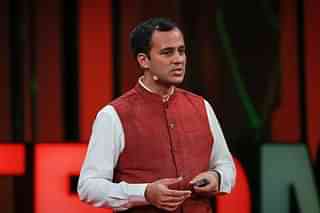 Dr Laxminarayan speaking at a TED event.