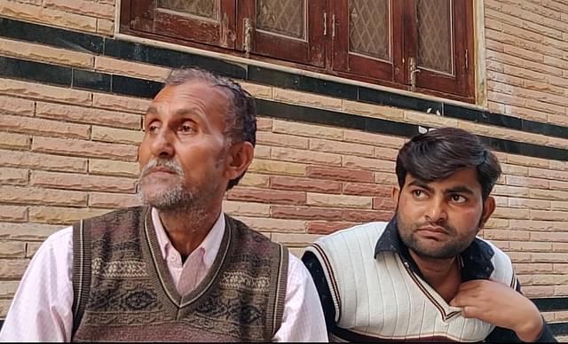 Shobharam and his son Kuldeep outside a neighbour’s house on 1 March/Swarajya&nbsp;