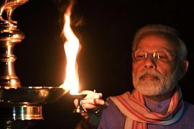 (PM Modi lighting a lamp on Sunday evening, 5 April)