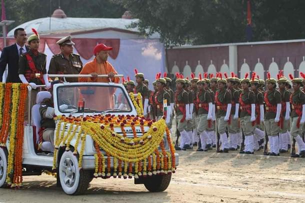 Uttar Pradesh Chief Minister Yogi Adityanath reviewing a police parade. 