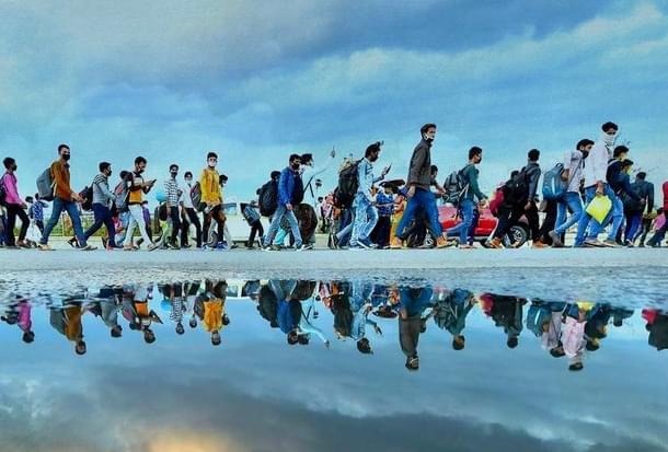 Migrant workers walk to their native villages after the announcement of 21-day nationwide lockdown. 