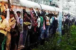 Crowded Local Train in Mumbai&nbsp; (Photo by Sattish Bate/Hindustan Times via Getty Images)