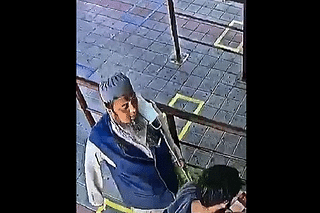 CCTV footage capturing the man who spit on another railways passenger (Pic via ViralPress)