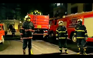 Firefighters outside Fortune hotel in Mumbai where fire broke out (video screengrab)