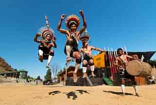 Tourism in India (Zeliang Naga Tribesmen of Nagaland rehearsing their traditional dance)
