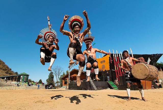Zeliang Naga Tribesmen of Nagaland rehearsing their traditional dance during Hornbill Festival on 10th Dec 2014.