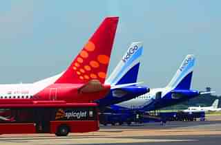 The picture featuring planes of various airlines parked at the IGI airport. (Ramesh Pathania/Mint via Getty Images)