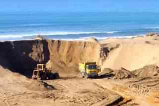 Beach sand mining.