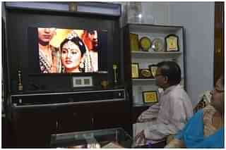 A family watching Ramayan at home. &nbsp;