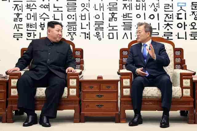 Supreme Leader of North Korea Kim Jong-un and President of South Korea Moon Jae-In (Korea Summit Press Pool/Getty Images)