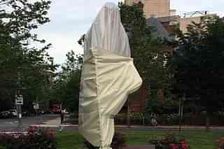 Covered up statue