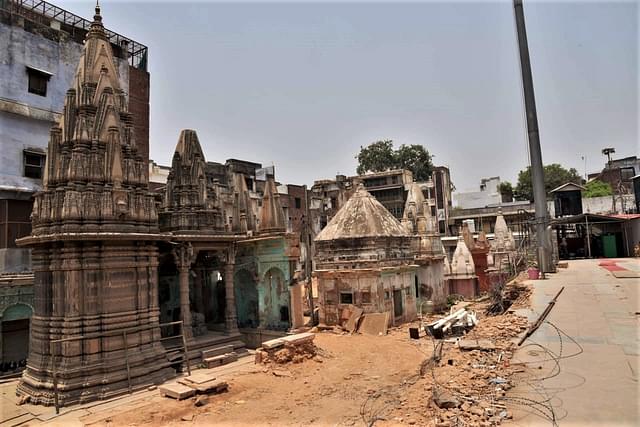 All the structures around the temples that emerged are being cleared and the debris removed