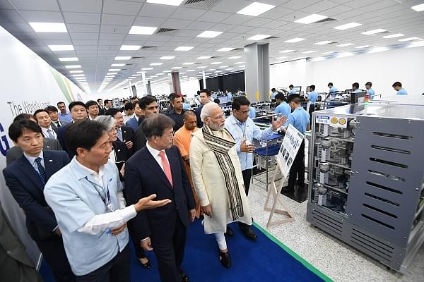PM Modi at Samsung’s plant in Noida (@MEAIndia/Twitter)