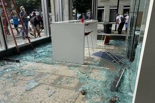 Damaged newspaper office (@LeighTauss)