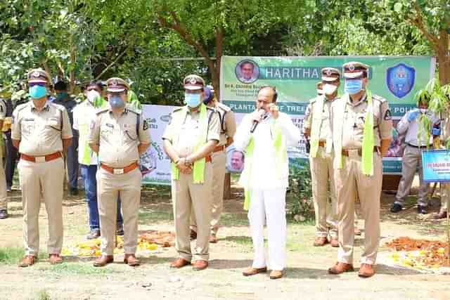 Telangana Home Minister Mohammed Mahmood Ali with state police officials. (Picture via Twitter)