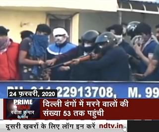 Hindu rioters on the roof of Mohan Nursing Home