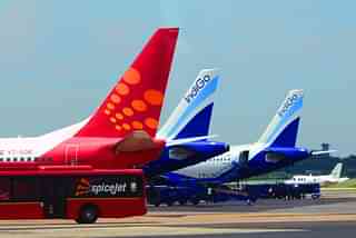 SpiceJet and IndiGo planes parked at the Indira Gandhi International  airport. (Ramesh Pathania/Mint via Getty Images)