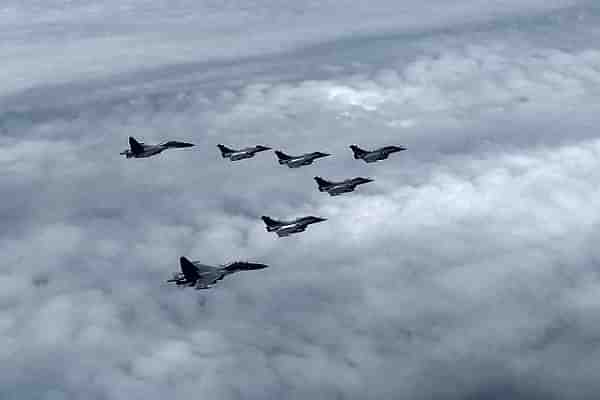 Rafales escorted by IAF's Sukhois