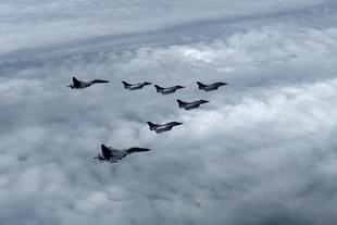 Rafales escorted by IAF's Sukhois