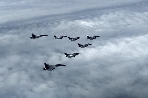 Rafales escorted by IAF's Sukhois