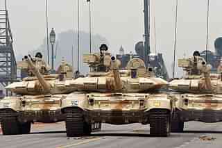 
Indian Army T-90 ‘Bheesma’ tanks roll through Janpath during 
rehearsals for the Indian Republic Day parade in New Delhi. (Photo Credit: RAVEENDRAN/AFP/Getty Images)

