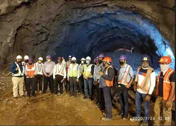 The engineers at the site of the tunnel.