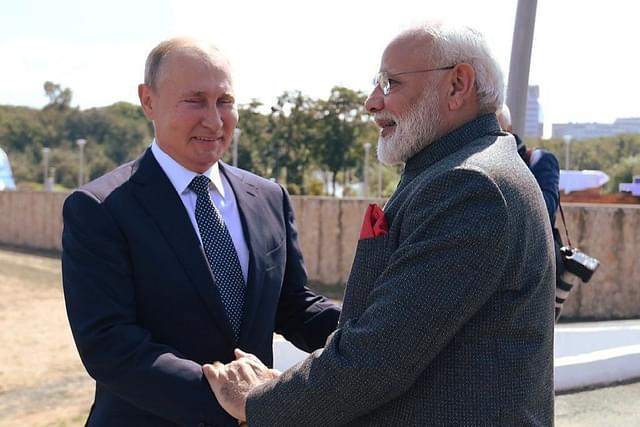 PM Modi with Vladimir Putin at the EEF. (via Twitter)