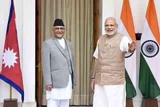 Prime Minister Narendra Modi with Nepal Prime Minister Khadga Prasad Sharma Oli. (Sonu Mehta/Hindustan Times via Getty Images)