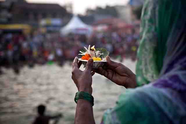 Hindu devotees gather before the second ‘Shahi Snan’ (grand bath) of Kumbh Mela in the Godavari river in 2015 in Nashik, India. (Allison Joyce/Getty Images)