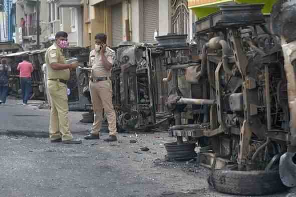 Vehicles damaged during the Bengaluru riots.