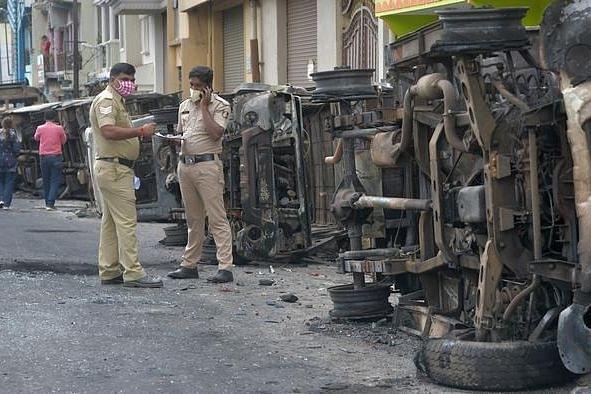 Vehicles damaged during the Bengaluru riots.