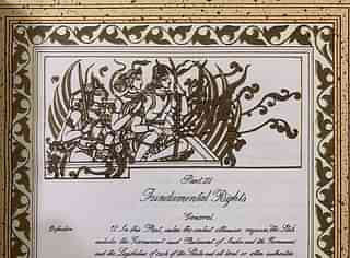 Original copy of the Constitution of India with a picture of Lord Ram on it.