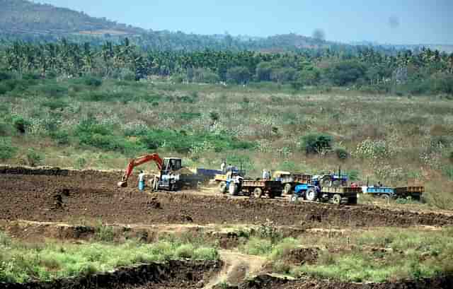 tractors on the field. 