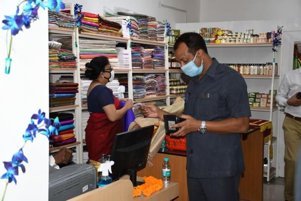 An SPG staff making a purchase.