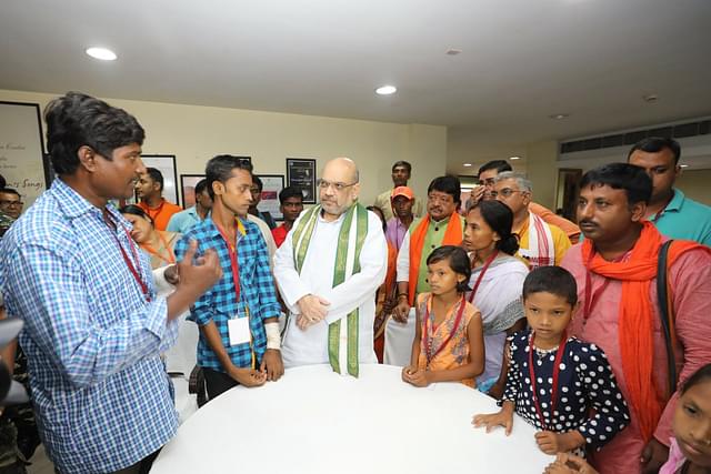 Then BJP president Amit Shah meeting victims of political violence in Bengal (@AmitShah/Twitter) 