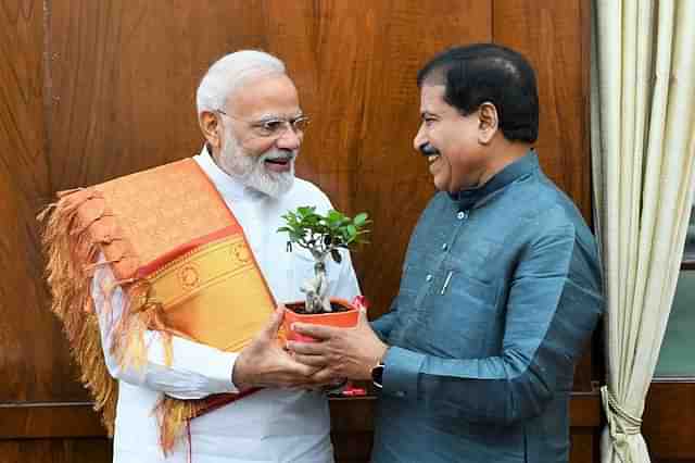 Prime Minister Narendra Modi with Suresh Angadi.