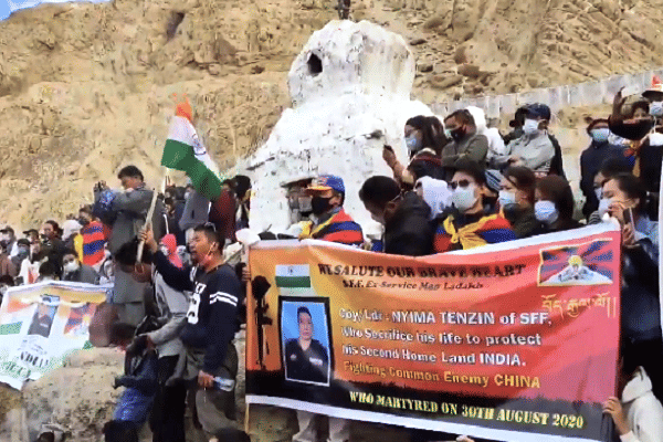 People paying tribute to Nyima Tenzin