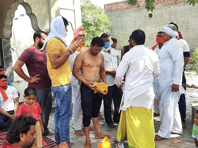A Muslim Doom member accepting Janeu at ‘ghar wapsi’ ceremony on 7 June