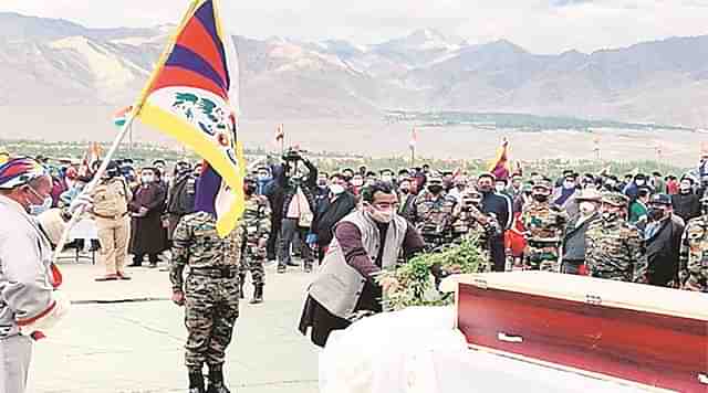 BJP leader Ram Madhav at cremation of Nyima Tenzin of Special Frontier Force. (Photo: Twitter)