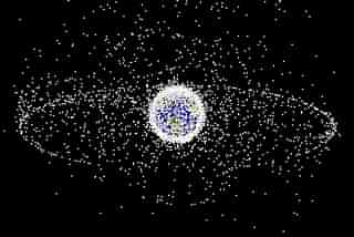 A swarm of satellites and debris around Earth