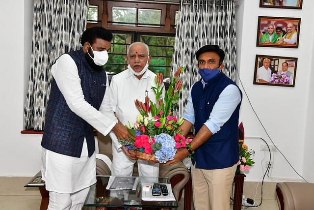 Outgoing Minister for Health and current Minister for Social Welfare B Sriramulu and Minister for Health and Medical Education Dr Sudhakar, with CM B S Yediyurappa