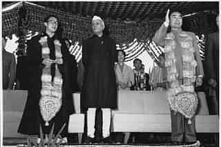 The Dalai Lama, Nehru and Zhou Enlai in 1956 in India, at the UNESCO Buddhist Conference in Ashok Hotel, New Delhi. (Homai Vyarawalla/Wikimedia Commons)