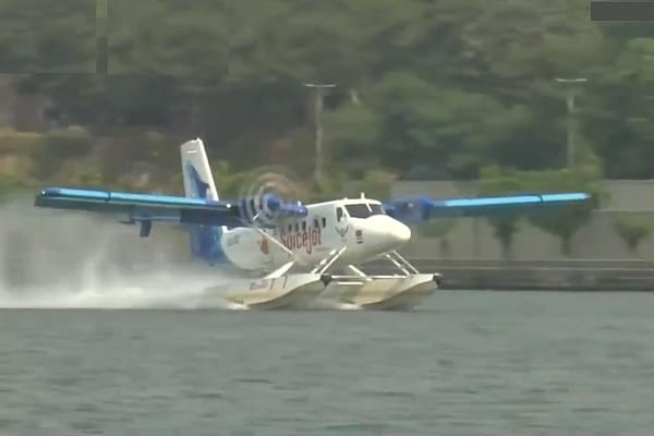 PM Modi travelled in the inaugural flight of the seaplane from Kevadia to Sabarmati riverfront in Ahmedabad (Pic Via Twitter)