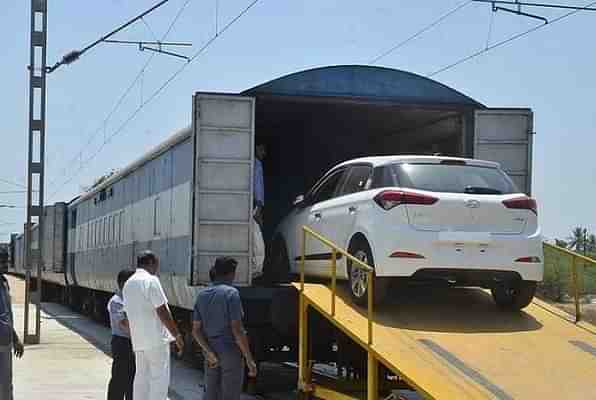 Cars being loaded on to a rake.