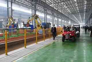 PM Modi on a visit to the Modern Coach Factory, Rae Bareli.