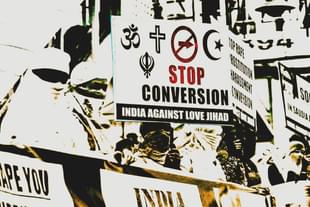 Women hold placards and form a human chain to protest against love <i>jihad </i>and conversion to Islam. (Original picture by Mujeeb Faruqui/Hindustan Times via GettyImages) 