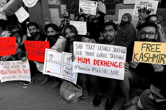 ‘Hum Dekhenge’ and ‘Free Kashmir’ posters at an anti-CAA protest.&nbsp;